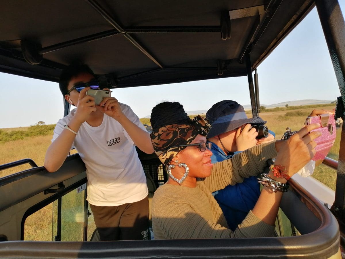 Guests on Safari In Masai Mara - Cheetah Safari Jeeps - Cheetah Safaris